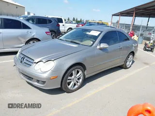 2007 Mercedes-Benz CLK-Class 3.5L with VIN WDBTJ56H47F215889, listed as a IAAI auction lot 42109563 with 106,593 mi miles. Bid and sale history available at carsss.com. Image 2.