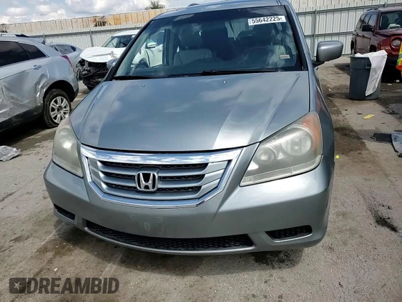 2010 Honda Odyssey EX-L с VIN 5FNRL3H79AB073307, выставлен на аукционе Copart как лот 55642225 с пробегом Не указан миль и Списание • Salvage title. История ставок и продаж доступна на DreamBid. Изображение 14.