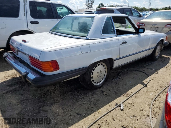 1989 Mercedes-Benz 560 SL z VIN WDBBA48D0KA098625, wystawiony jako Copart lot #73863784 z przebiegiem 30 648 mil mil oraz Szkoda całkowita • Salvage title. Historia ofert i sprzedaży dostępna na DreamBid. Obrazek 3.