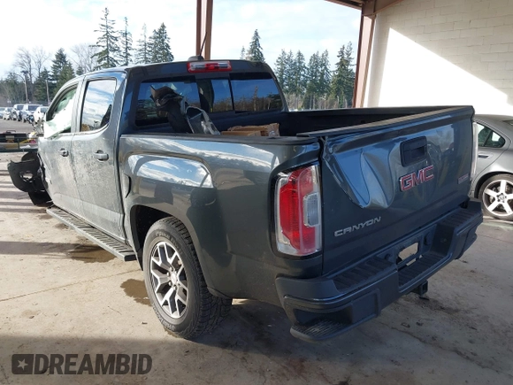 2015 GMC Canyon 2WD SLE with VIN 1GTG5BE37F1265497, listed as a IAAI auction lot 41507236 with 101,385 mi miles. Bid and sale history available at carsss.com. Image 3.
