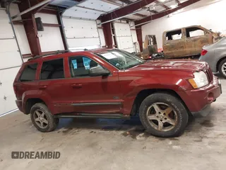 2007 Jeep Grand Cherokee Laredo with VIN 1J8GR48K97C631672, listed as a IAAI auction lot 41520054 with 231,576 mi miles. Bid and sale history available at carsss.com. Image 13.