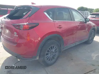 2017 Mazda CX-5 Touring with VIN JM3KFACL3H0195212, listed as a IAAI auction lot 42041361 with 57,377 mi miles and . Bid and sale history available at carsss.com. Image 4.