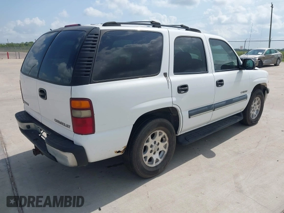 2002 Chevrolet Tahoe LS z VIN 1GNEC13Z42R214489, wystawiony jako IAAI lot #42438810 z przebiegiem 243 161 mil mil oraz . Historia ofert i sprzedaży dostępna na DreamBid. Obrazek 4.
