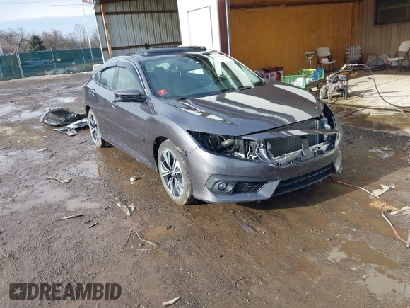 2018 Honda Civic EX-L z VIN JHMFC1F85JX014701, wystawiony jako IAAI lot #41467342 z przebiegiem 50 292 mil mil oraz . Historia ofert i sprzedaży dostępna na DreamBid. Obrazek 1.