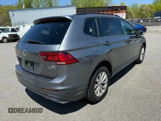 2018 Volkswagen Tiguan S z VIN 3VV0B7AX2JM014870, wystawiony jako Copart lot #57364305 z przebiegiem 118 522 mil mil oraz Czysty tytuł • Clean title. Historia ofert i sprzedaży dostępna na DreamBid. Obrazek 3.