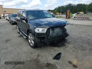 2014 Dodge Durango Limited z VIN 1C4RDHDG5EC313892, wystawiony jako Copart lot #52634355 z przebiegiem 167 053 mil mil oraz Szkoda całkowita • Salvage title. Historia ofert i sprzedaży dostępna na DreamBid. Obrazek 11.