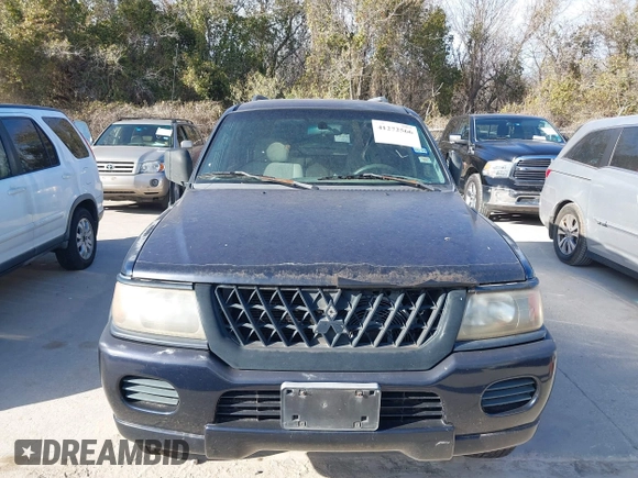 2002 Mitsubishi Montero ES z VIN JA4LS21H02J040318, wystawiony jako IAAI lot #41272566 z przebiegiem 278 339 mil mil oraz . Historia ofert i sprzedaży dostępna na DreamBid. Obrazek 6.