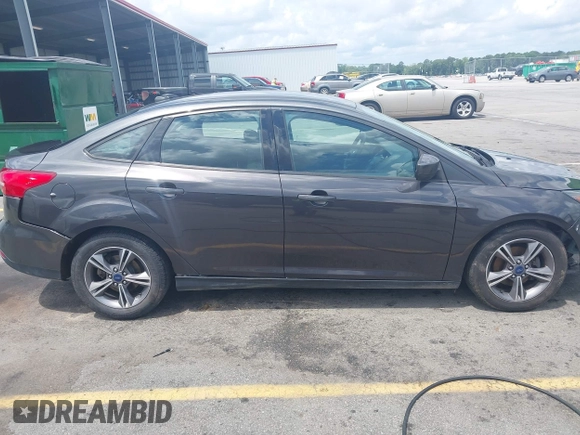2018 Ford Focus SE with VIN 1FADP3FE2JL263954, listed as a IAAI auction lot 42480748 with 111,059 mi miles and . Bid and sale history available at DreamBid. Image 13.