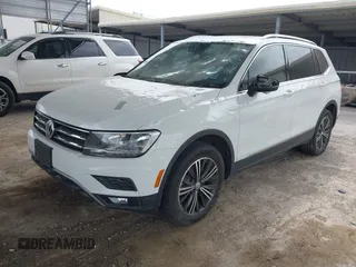 2018 Volkswagen Tiguan SEL with VIN 3VV2B7AX8JM120443, listed as a IAAI auction lot 42154773 with 70,256 mi miles and . Bid and sale history available at DreamBid. Image 21.