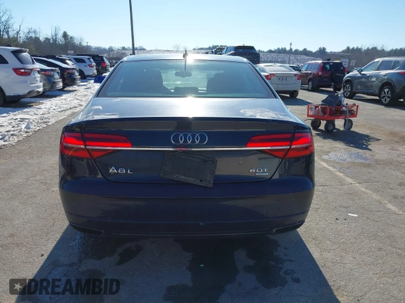 2017 Audi A8 L Sport with VIN WAU43AFDXHN003685, listed as a IAAI auction lot 41264314 with 114,828 mi miles. Bid and sale history available at carsss.com. Image 16.