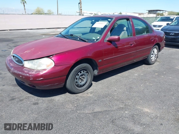 1999 Ford Contour z VIN 1FAFP6538XK117065, wystawiony jako IAAI lot #42088857 z przebiegiem 138 489 mil mil oraz . Historia ofert i sprzedaży dostępna na DreamBid. Obrazek 2.