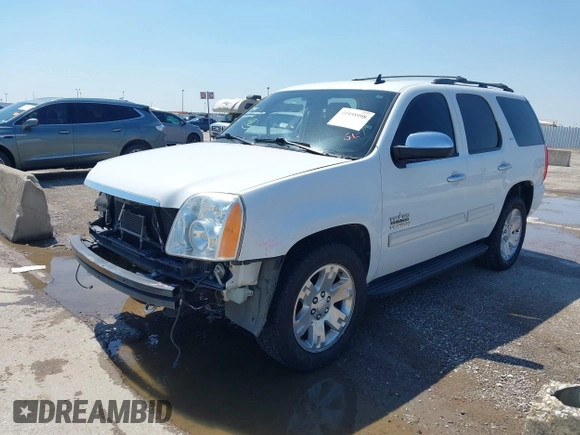 2011 GMC Yukon SLT z VIN 1GKS1CE00BR210794, wystawiony jako IAAI lot #41958998 z przebiegiem 225 407 mil mil oraz . Historia ofert i sprzedaży dostępna na DreamBid. Obrazek 2.