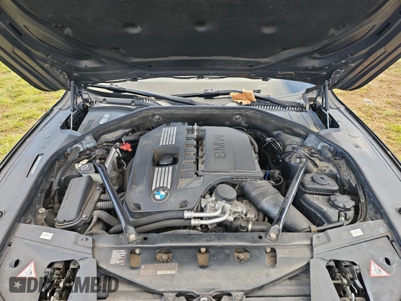 2012 BMW 7 Series 740i with VIN WBAKA4C52CC613791, listed as a Copart auction lot 82473894 with 132,656 mi miles and Clean Title. Bid and sale history available at carsss.com. Image 7.