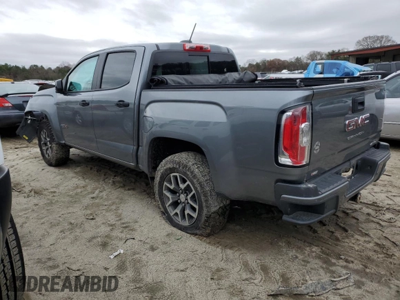 2022 GMC Canyon 4WD AT4 z VIN 1GTG6FENXN1274389, wystawiony jako Copart lot #85255404 z przebiegiem 42 843 mil mil oraz Szkoda całkowita • Salvage title. Historia ofert i sprzedaży dostępna na DreamBid. Obrazek 2.