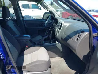 2005 Ford Escape XLS Value with VIN 1FMYU02Z85KD90338, listed as a IAAI auction lot 41916569 with 174,870 mi miles. Bid and sale history available at carsss.com. Image 5.