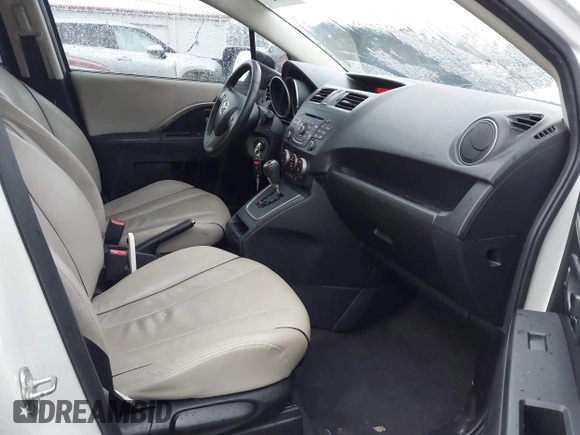2015 Mazda Mazda5 Grand Touring with VIN JM1CW2DL6F0185594, listed as a IAAI auction lot 41470568 with 116,309 mi miles. Bid and sale history available at carsss.com. Image 5.