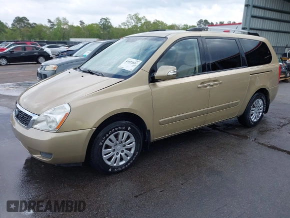 2011 Kia Sedona LX with VIN KNDMG4C71B6407306, listed as a IAAI auction lot 41922697 with 243,248 mi miles. Bid and sale history available at carsss.com. Image 2.