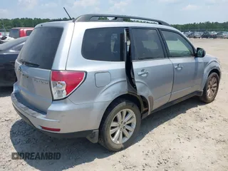 2012 Subaru Forester X Premium with VIN JF2SHBDC0CH409737, listed as a IAAI auction lot 42564484 with 226,983 mi miles and . Bid and sale history available at DreamBid. Image 4.