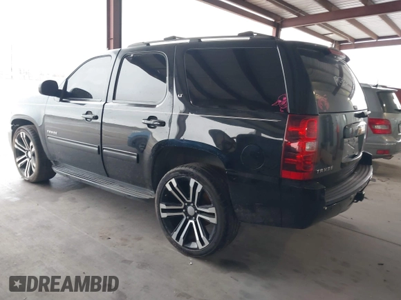 2014 Chevrolet Tahoe LT z VIN 1GNSCBE01ER190342, wystawiony jako IAAI lot #41578109 z przebiegiem 204 781 mil mil oraz . Historia ofert i sprzedaży dostępna na DreamBid. Obrazek 3.