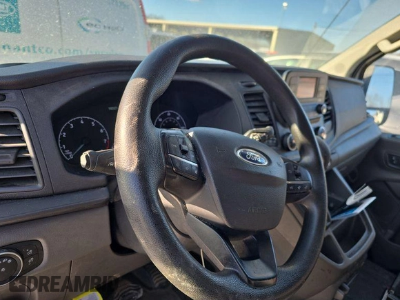 2020 Ford Transit Cargo with VIN 1FTBR1Y82LKB08403, listed as a IAAI auction lot 42279744 with 102,527 mi miles and . Bid and sale history available at DreamBid. Image 19.