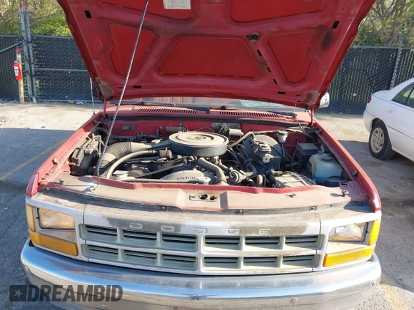 1991 Dodge Dakota "S" with VIN 1B7FL26X4MS257044, listed as a IAAI auction lot 42038980 with 120,127 mi miles. Bid and sale history available at carsss.com. Image 10.