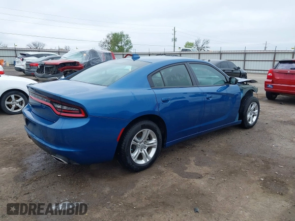2023 Dodge Charger SXT with VIN 2C3CDXBGXPH674476, listed as a IAAI auction lot 41910339 with 14,079 mi miles. Bid and sale history available at carsss.com. Image 4.