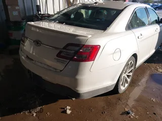 2015 Ford Taurus Limited z VIN 1FAHP2F88FG125499, wystawiony jako IAAI lot #41343023 z przebiegiem 126 047 mil mil oraz . Historia ofert i sprzedaży dostępna na DreamBid. Obrazek 4.