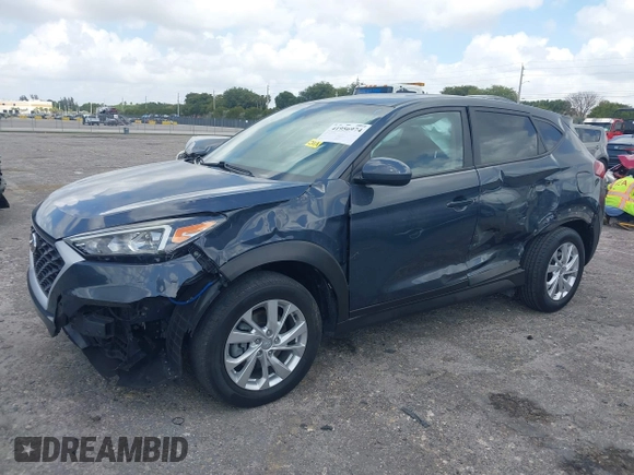 2021 Hyundai Tucson SE with VIN KM8J23A41MU291085, listed as a IAAI auction lot 41956974 with 93,932 mi miles. Bid and sale history available at carsss.com. Image 6.