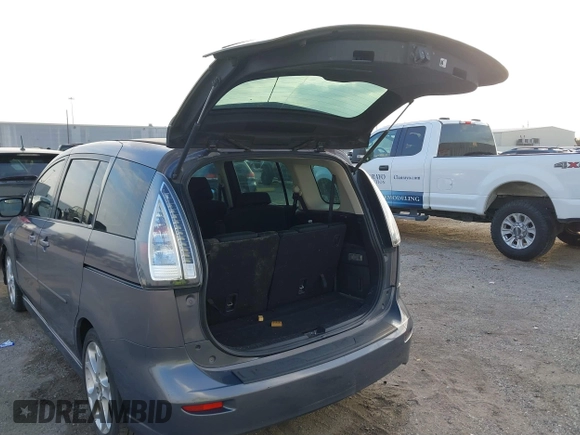 2009 Mazda 5 Sport with VIN JM1CR29L990341261, listed as a IAAI auction lot 41522567 with 123,465 mi miles and . Bid and sale history available at DreamBid. Image 17.