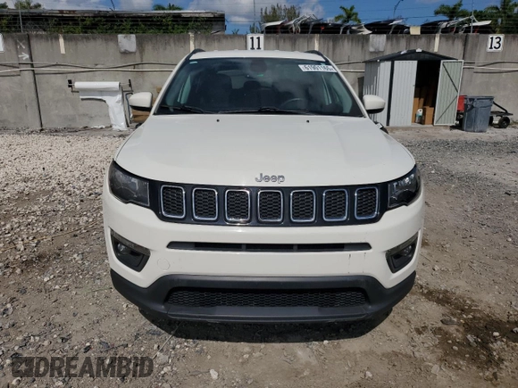2019 Jeep Compass Latitude z VIN 3C4NJDBB8KT735291, wystawiony jako Copart lot #61901165 z przebiegiem 94 870 mil mil oraz Szkoda całkowita • Salvage title. Historia ofert i sprzedaży dostępna na DreamBid. Obrazek 5.