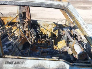 1996 Chevrolet Tracker z VIN 2CNBJ1869T6914128, wystawiony jako IAAI lot #41399004 z przebiegiem Nie podano mil oraz . Historia ofert i sprzedaży dostępna na DreamBid. Obrazek 5.