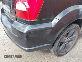2010 Dodge Caliber SXT z VIN 1B3CB4HA4AD662848, wystawiony jako IAAI lot #42219069 z przebiegiem 177 644 mil mil oraz . Historia ofert i sprzedaży dostępna na DreamBid. Obrazek 12.