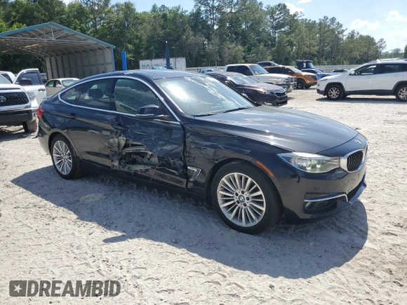 2014 BMW 3 Series 328i Gran Turismo xDrive with VIN WBA3X5C56ED557120, listed as a Copart auction lot 55584315 with 154,405 mi miles and Salvage title. Bid and sale history available at DreamBid. Image 4.