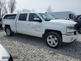 2018 Chevrolet Silverado 1500 LT with VIN 3GCUKREC7JG514282, listed as a Copart auction lot 51233285 with 201,593 mi miles and Clean Title. Bid and sale history available at carsss.com. Image 4.