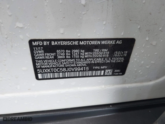 2018 BMW X5 xDrive40e iPerformance with VIN 5UXKT0C58J0V99415, listed as a IAAI auction lot 41391474 with 124,671 mi miles. Bid and sale history available at carsss.com. Image 9.