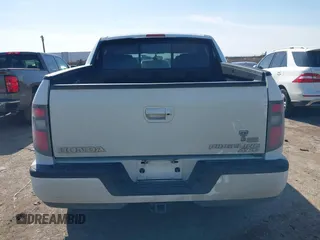 2014 Honda Ridgeline Sport with VIN 5FPYK1F78EB011254, listed as a IAAI auction lot 41564771 with 151,741 mi miles and . Bid and sale history available at DreamBid. Image 17.