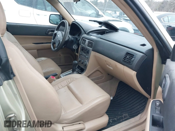 2003 Subaru Forester XS with VIN JF1SG65683H734188, listed as a IAAI auction lot 41584619 with 242,536 mi miles. Bid and sale history available at carsss.com. Image 5.
