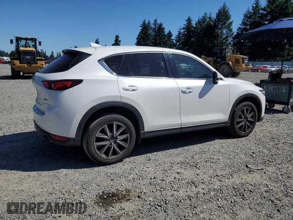 2018 Mazda CX-5 Grand Touring with VIN JM3KFBDM0J0419989, listed as a Copart auction lot 62868005 with 120,217 mi miles and Salvage title. Bid and sale history available at DreamBid. Image 3.