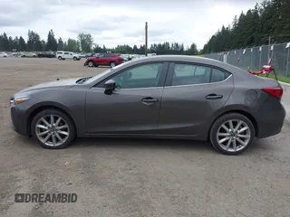 2017 Mazda 3 Touring with VIN 3MZBN1V73HM118104, listed as a IAAI auction lot 42139361 with 71,615 mi miles and . Bid and sale history available at DreamBid. Image 13.