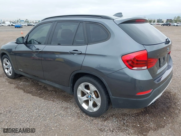 2013 BMW X1 28i with VIN WBAVM1C51DVW42577, listed as a IAAI auction lot 42029627 with 140,343 mi miles. Bid and sale history available at carsss.com. Image 3.