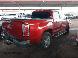 2015 GMC Canyon 2WD SLT with VIN 1GTG5CE39F1225427, listed as a IAAI auction lot 41453753 with 115,801 mi miles. Bid and sale history available at carsss.com. Image 4.