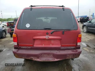 1999 Mercury Mountaineer z VIN 4M2DU55P5XUJ16364, wystawiony jako Copart lot #57493435 z przebiegiem 166 256 mil mil oraz Tytuł czysty. Historia ofert i sprzedaży dostępna na DreamBid. Obrazek 6.