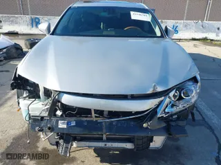 2014 Lexus ES 300h Hybrid with VIN JTHBW1GG6E2054347, listed as a IAAI auction lot 41546704 with 225,040 mi miles. Bid and sale history available at carsss.com. Image 13.