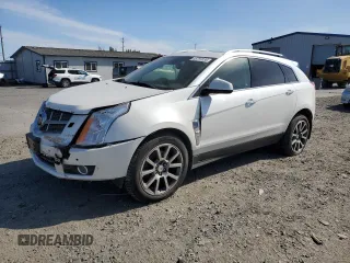 2012 Cadillac SRX Premium Collection z VIN 3GYFNFE39CS515037, wystawiony jako Copart lot #55797235 z przebiegiem 146 778 mil mil oraz Szkoda całkowita • Salvage title. Historia ofert i sprzedaży dostępna na DreamBid. Obrazek 1.