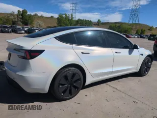 2025 Tesla Model 3 Long Range z VIN 5YJ3E1EA0SF931348, wystawiony jako Copart lot #57074935 z przebiegiem 2 153 mil mil oraz Szkoda całkowita • Salvage title. Historia ofert i sprzedaży dostępna na DreamBid. Obrazek 3.