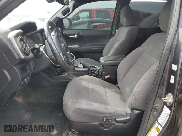 2019 Toyota Tacoma SR5 with VIN 3TMAZ5CN9KM090828, listed as a Copart auction lot 49498715 with 118,551 mi miles and Salvage title. Bid and sale history available at DreamBid. Image 7.