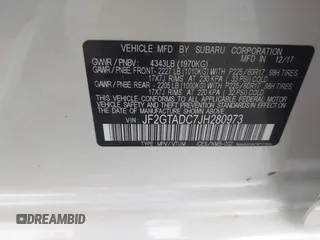 2018 Subaru Crosstrek Premium z VIN JF2GTADC7JH280973, wystawiony jako IAAI lot #41755157 z przebiegiem 72 011 mil mil oraz . Historia ofert i sprzedaży dostępna na DreamBid. Obrazek 9.