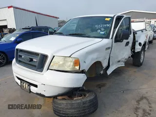 2006 Ford F-150 STX with VIN 1FTRF02226KB40343, listed as a IAAI auction lot 42250963 with 148,330 mi miles and . Bid and sale history available at DreamBid. Image 2.