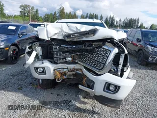 2019 GMC Sierra 2500HD Denali z VIN 1GT12SEY3KF269442, wystawiony jako IAAI lot #42231991 z przebiegiem 75 172 mil mil oraz . Historia ofert i sprzedaży dostępna na DreamBid. Obrazek 13.