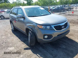 2012 Kia Sorento EX with VIN 5XYKUDA61CG244312, listed as a IAAI auction lot 42343888 with 164,520 mi miles and . Bid and sale history available at DreamBid. Image 1.
